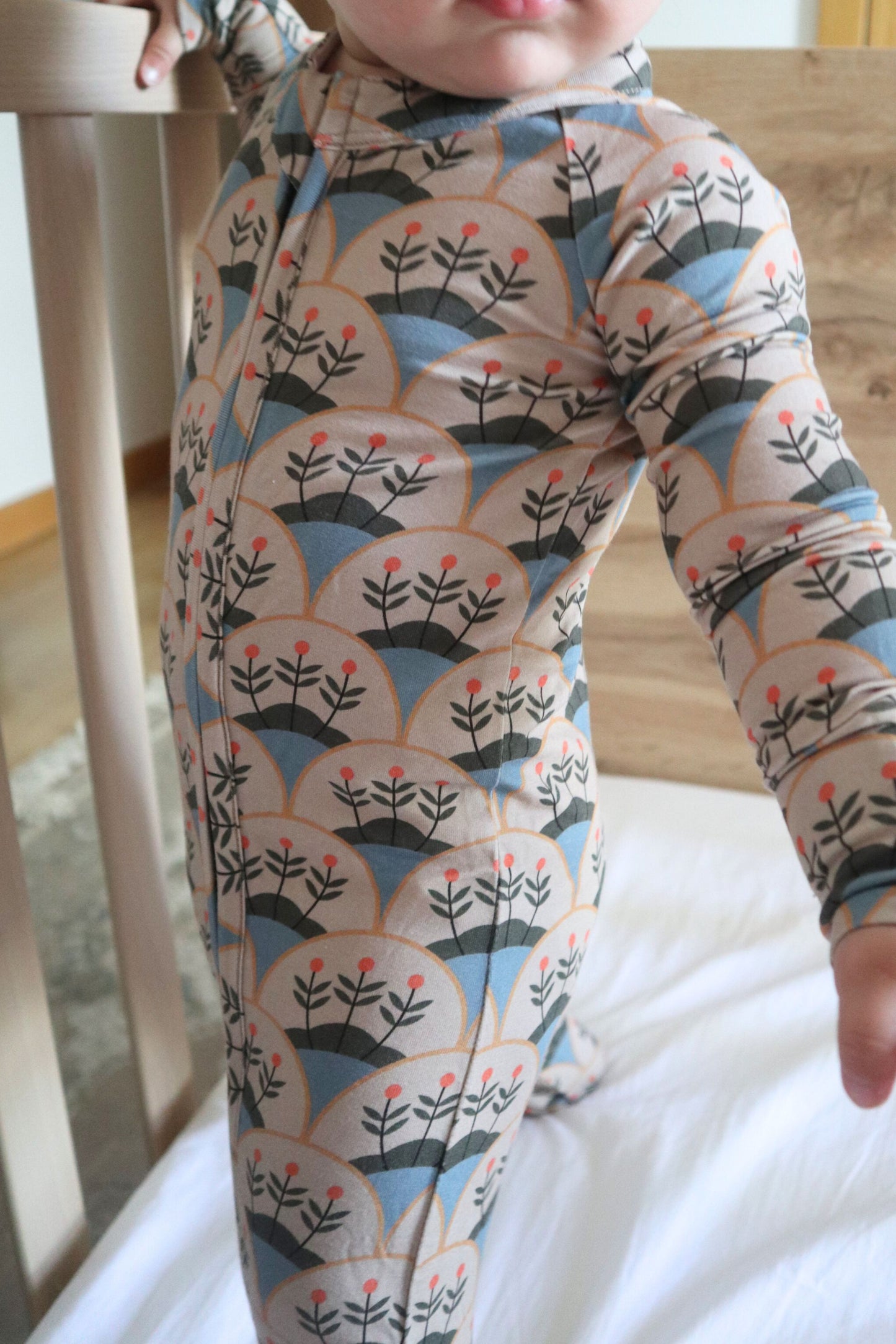 Bamboo baby pajamas in blue and beige with a boho floral print, soft and hypoallergenic, ideal for the delicate skin of the baby